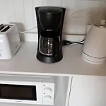 Prázdninový dům Jolie Maison En Pierres Avec Son Jardin Bucolique